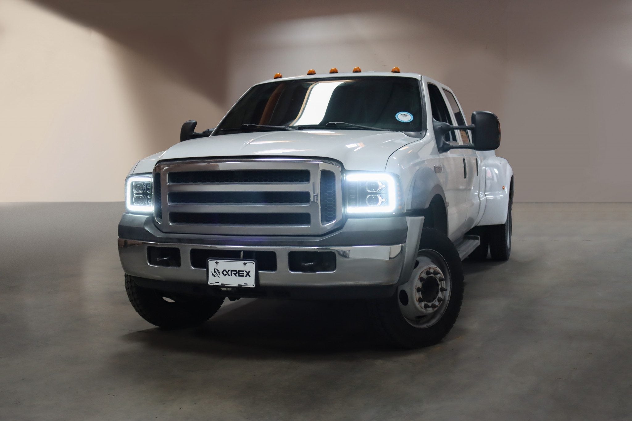 05-07 Ford F-250/350/450/550 Super Duty PRO-Series Halogen Projector Headlights Alpha-Black - Apollo Off-Road