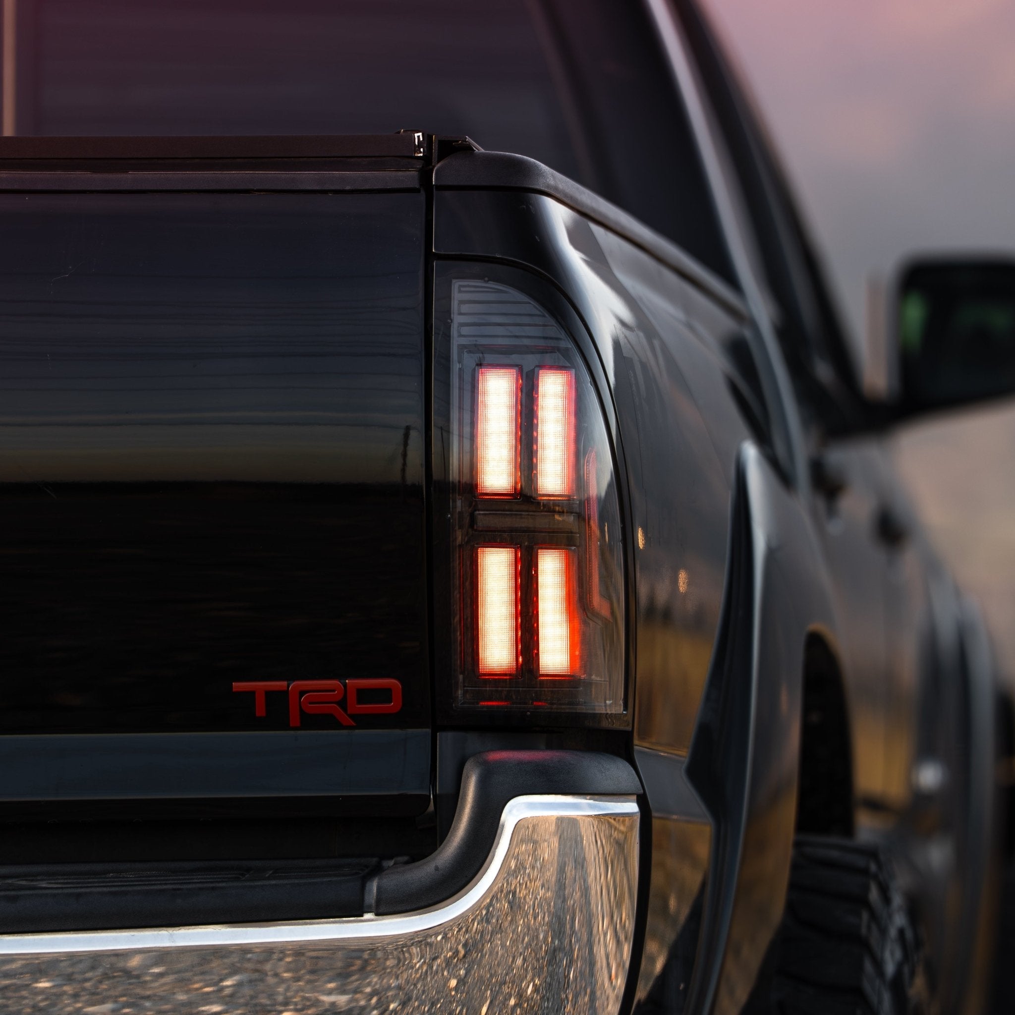 05-15 Toyota Tacoma NOVA-Series Prismatic LED Tail Lights Alpha-Black - Apollo Off-Road