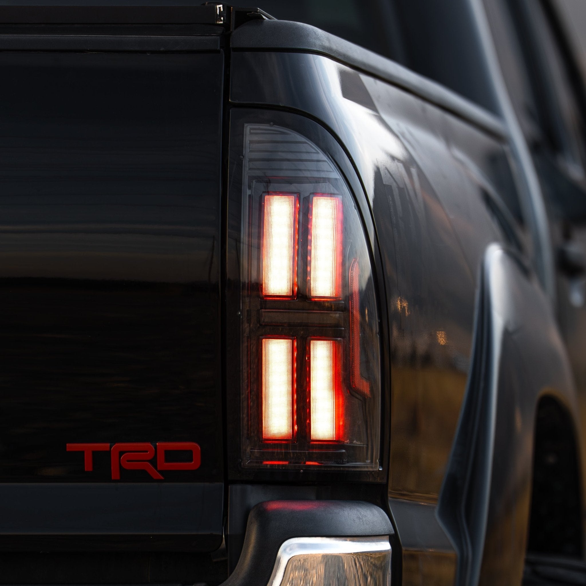 05-15 Toyota Tacoma NOVA-Series Prismatic LED Tail Lights Alpha-Black - Apollo Off-Road