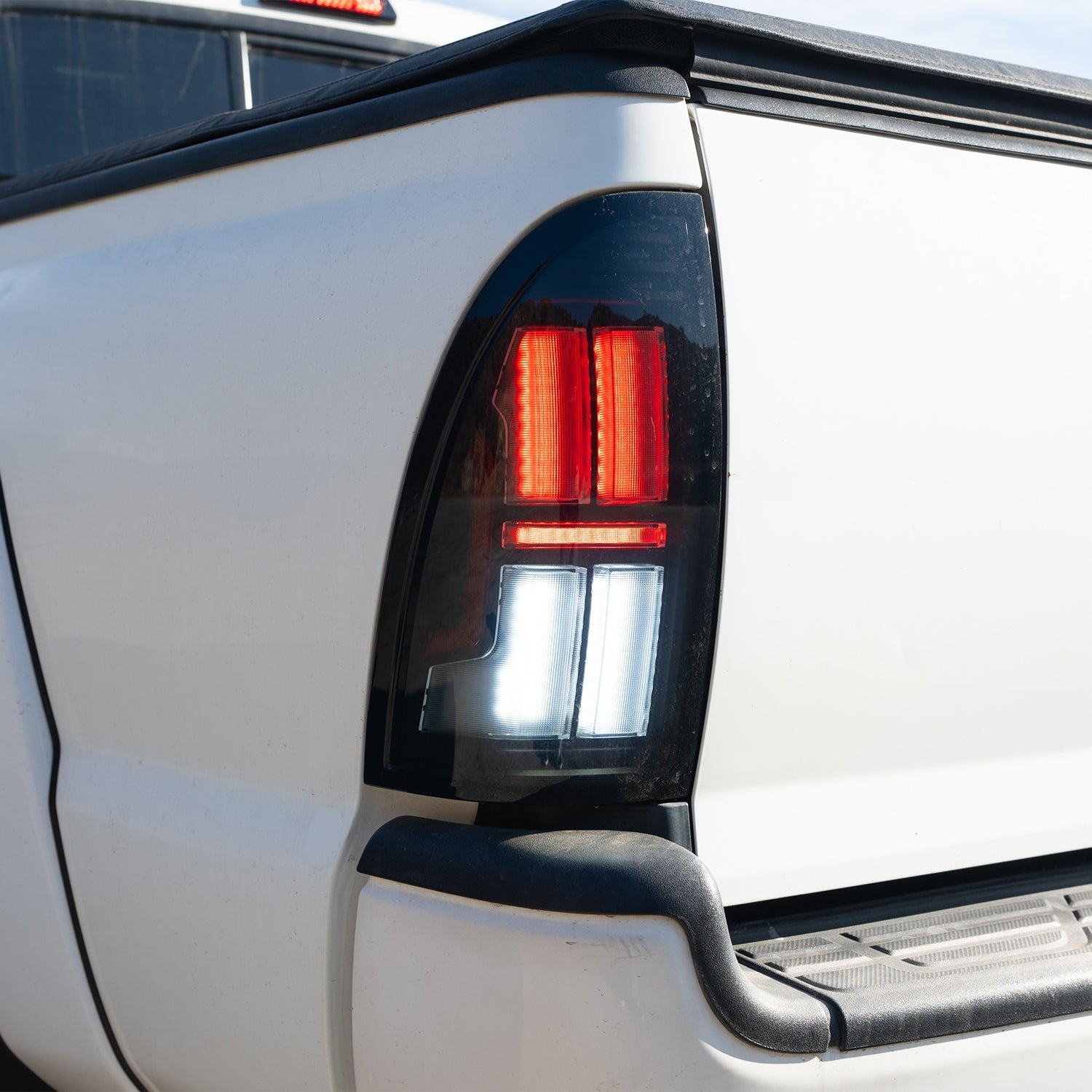 05-15 Toyota Tacoma NOVA-Series Prismatic LED Tail Lights Black - Apollo Off-Road