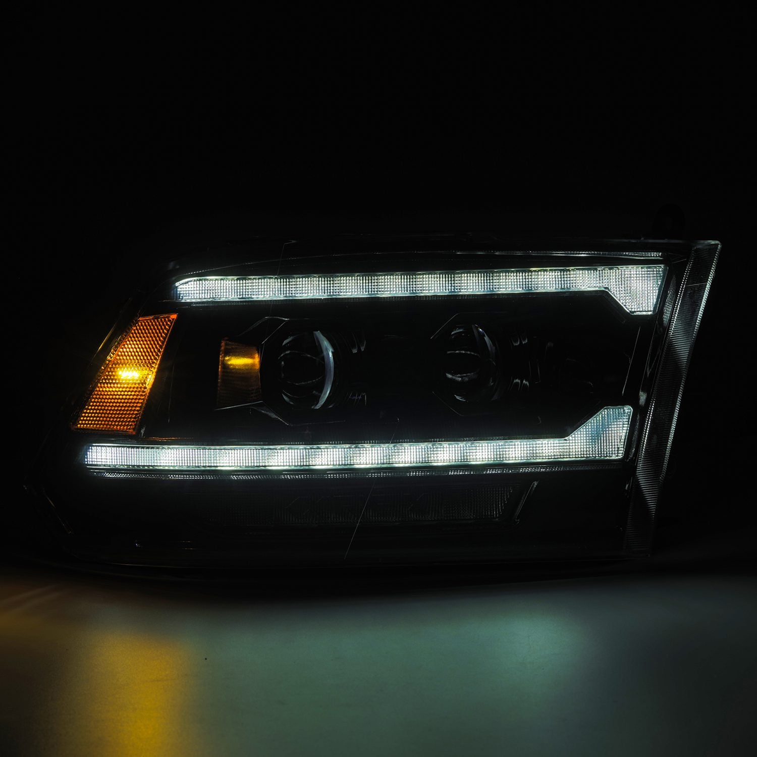 09-18 Dodge Ram LUXX-Series Projector Headlights Alpha- Black - Apollo Off-Road