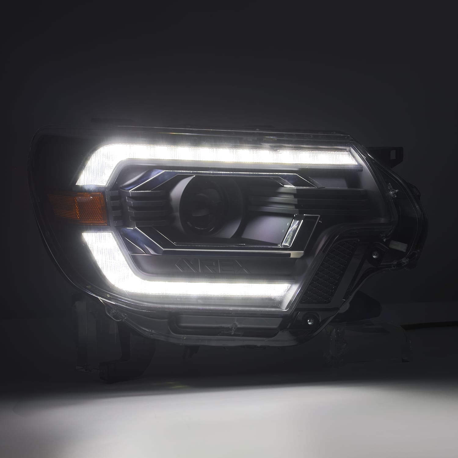 12-15 Toyota Tacoma LUXX-Series Projector Headlights Alpha-Black - Apollo Off-Road