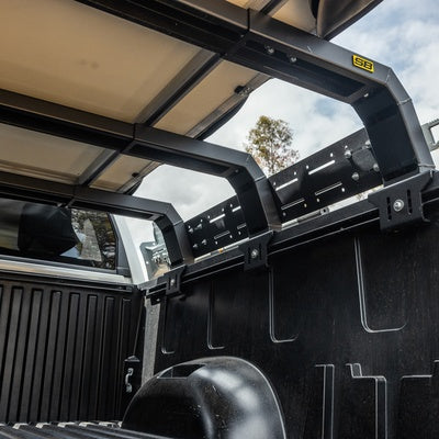 Defender Low Profile Bed Rack Black Carbon Steel Smittybilt