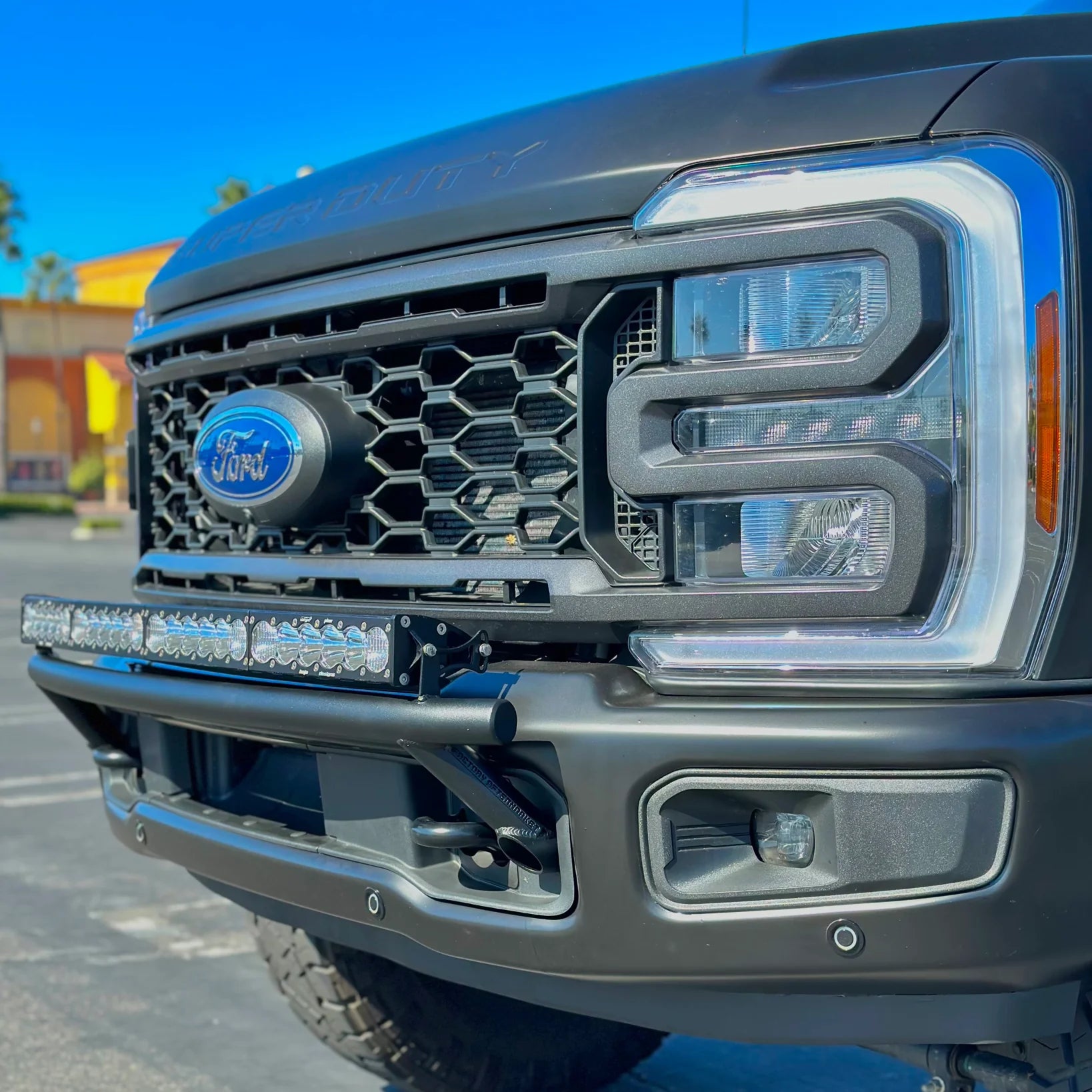 2017 - 2024 Ford Super Duty Light Mount - The "Low Pro" Series featuring a Baja Designs 40" Curved OnX6 Arc Mount Tabs - Apollo Off-Road