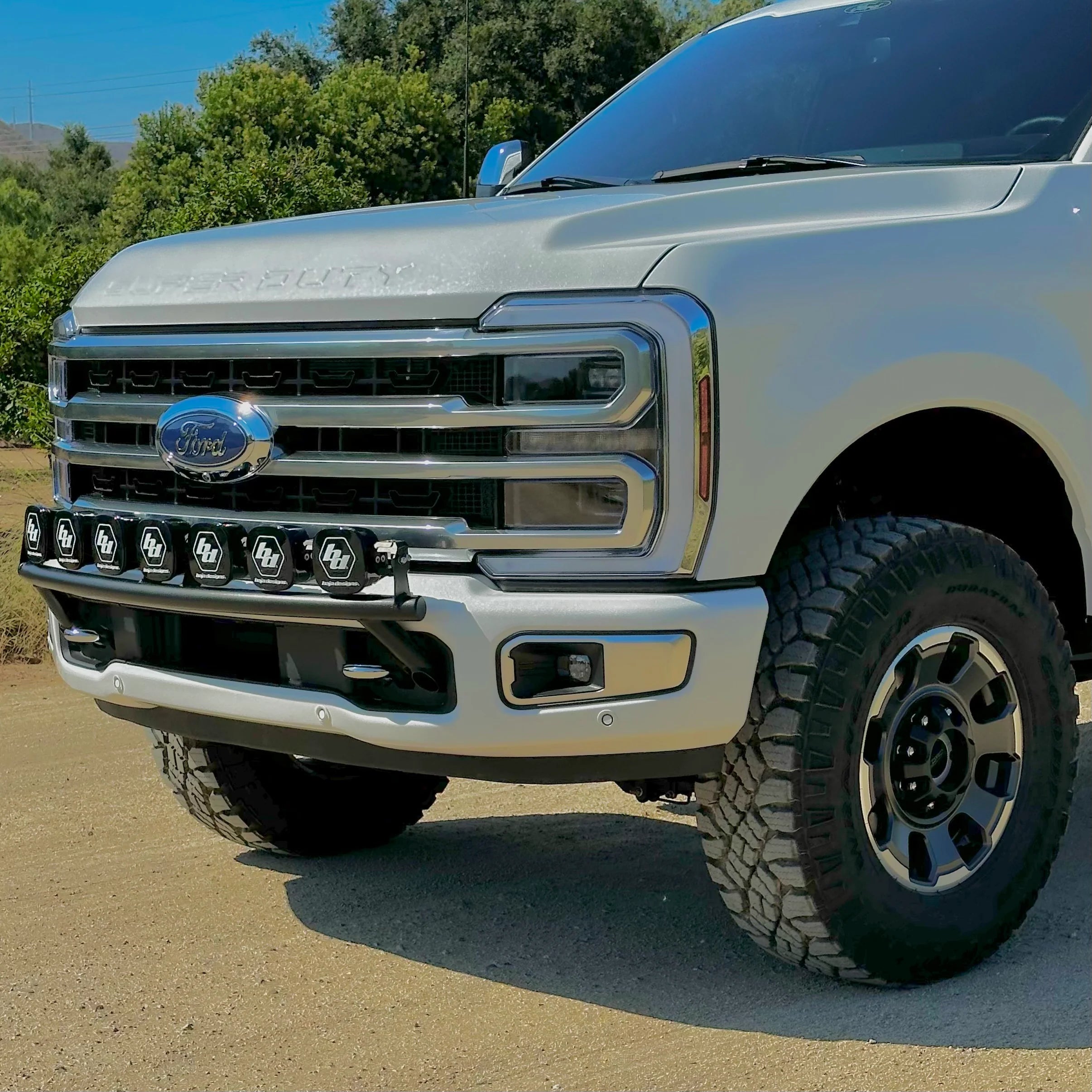 2017 - 2024 Ford Super Duty Light Mount - The "Low Pro" Series featuring a Baja Designs 40" Curved OnX6 Arc Mount Tabs - Apollo Off-Road
