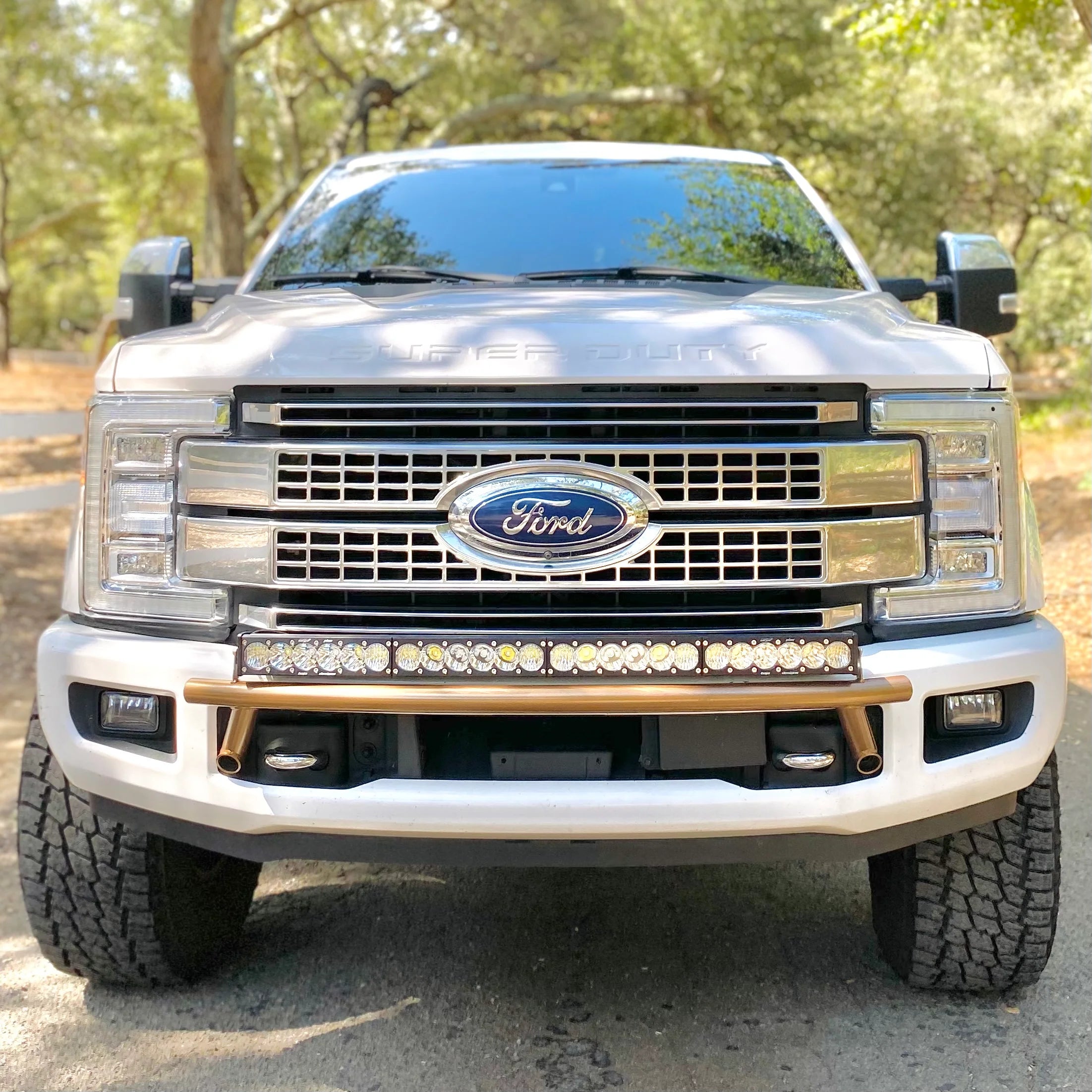2017 - 2024 Ford Super Duty Light Mount - The "Low Pro" Series featuring a Baja Designs 40" Curved OnX6 Arc Mount Tabs - Apollo Off-Road