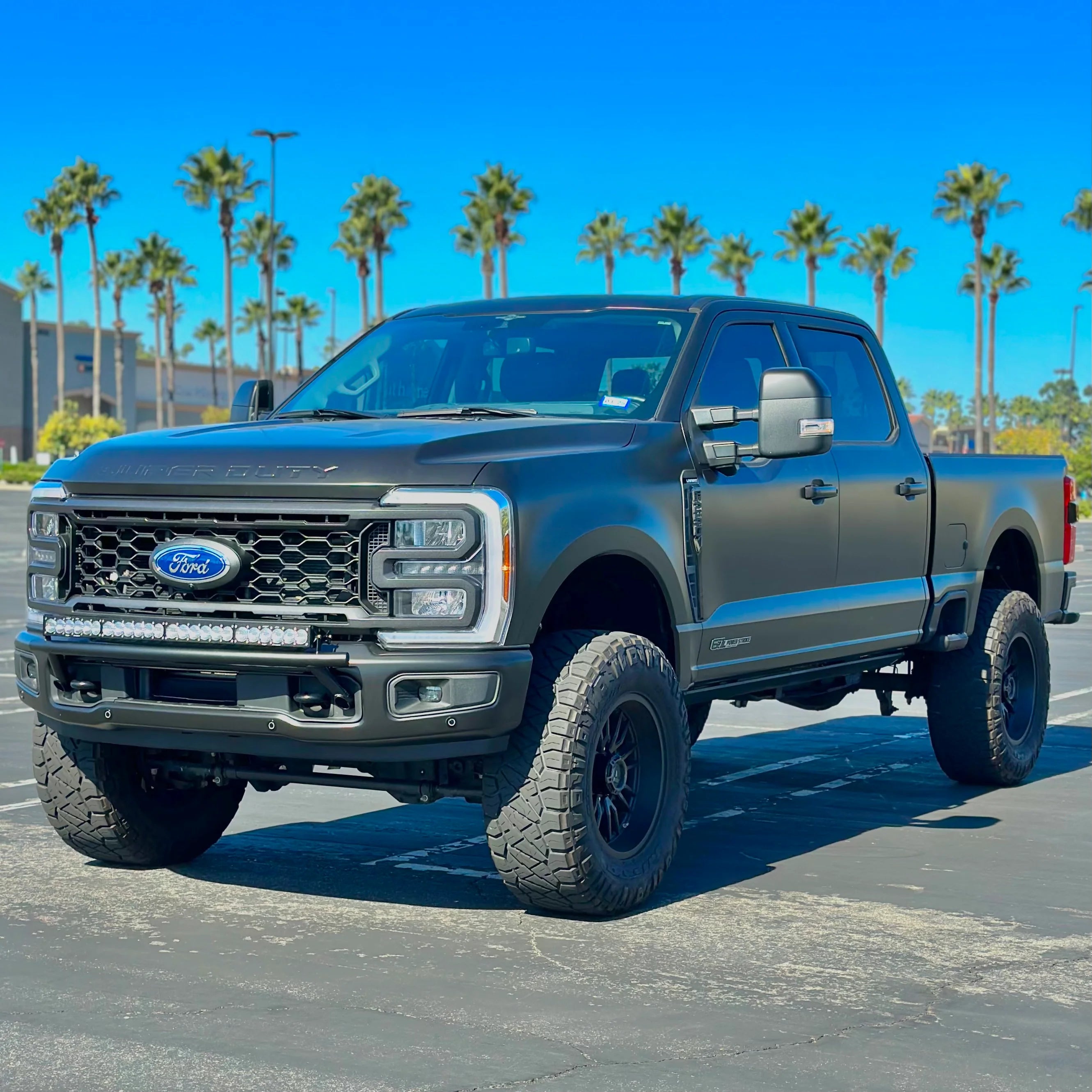 2017 - 2024 Ford Super Duty Light Mount - The "Low Pro" Series featuring a Baja Designs 40" Curved OnX6 Arc Mount Tabs - Apollo Off-Road