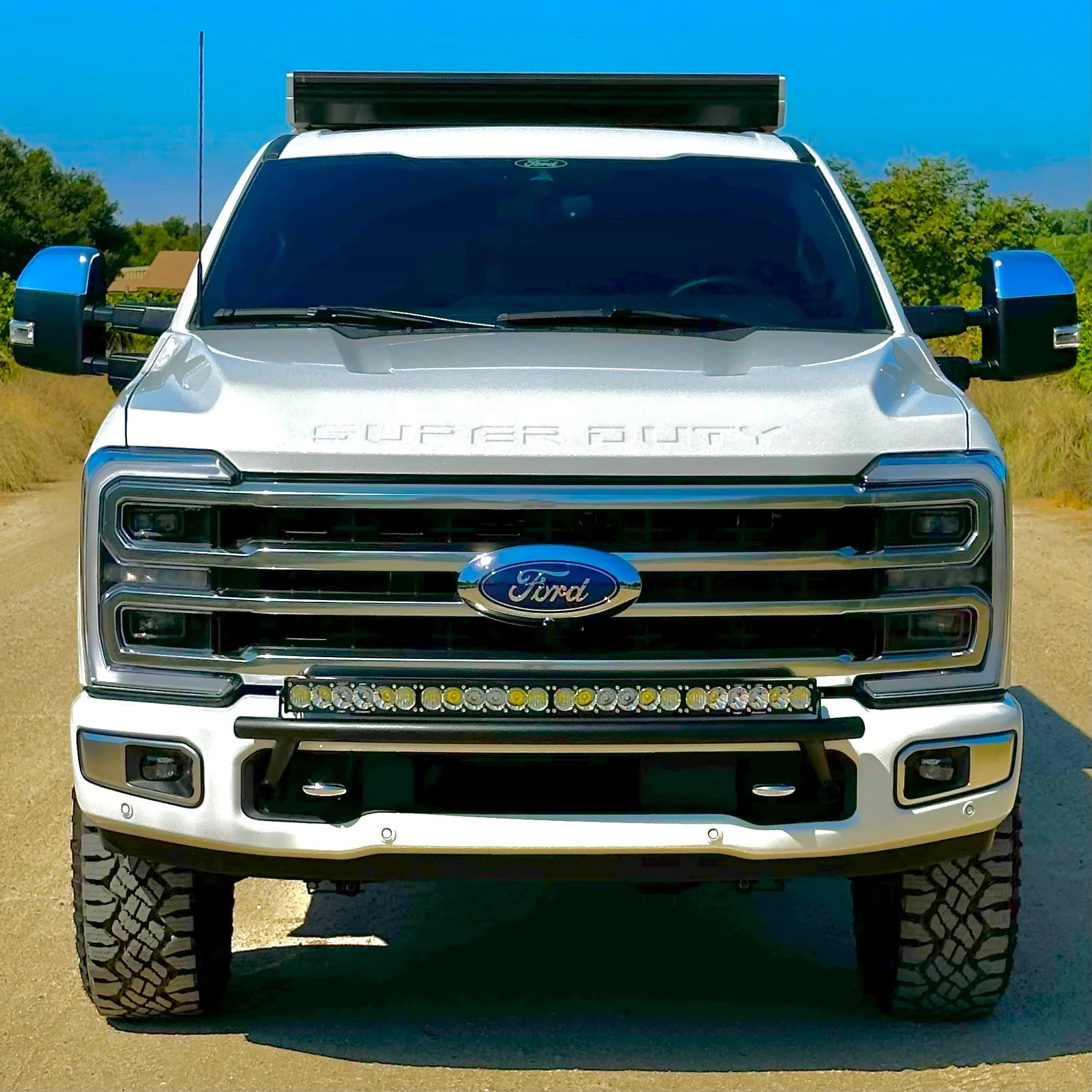 2017 - 2024 Ford Super Duty Light Mount - The "Low Pro" Series featuring a Baja Designs 40" Curved OnX6 Arc Mount Tabs - Apollo Off-Road