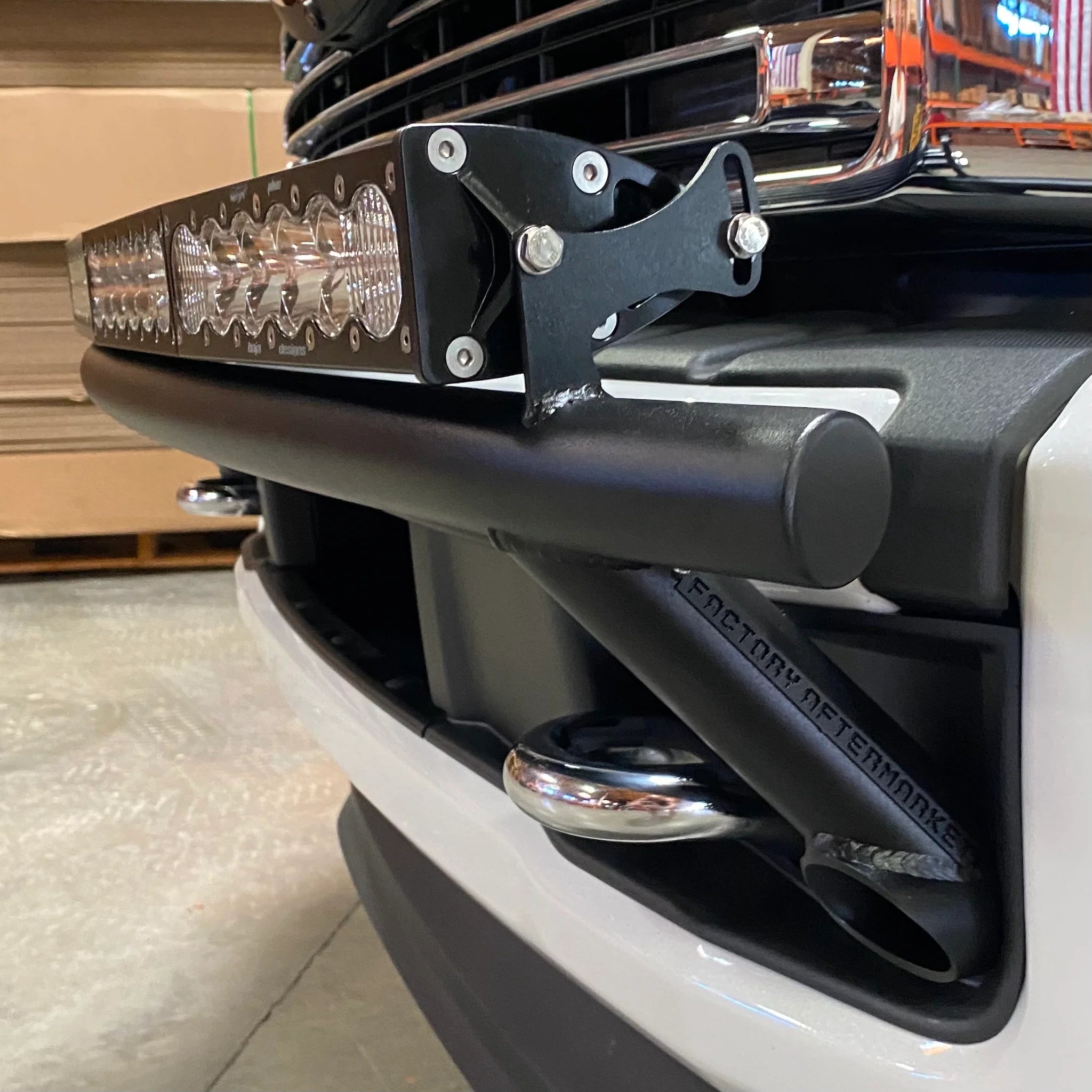 2017 - 2024 Ford Super Duty Light Mount - The "Low Pro" Series featuring a Baja Designs 40" Curved OnX6 Arc Mount Tabs - Apollo Off-Road
