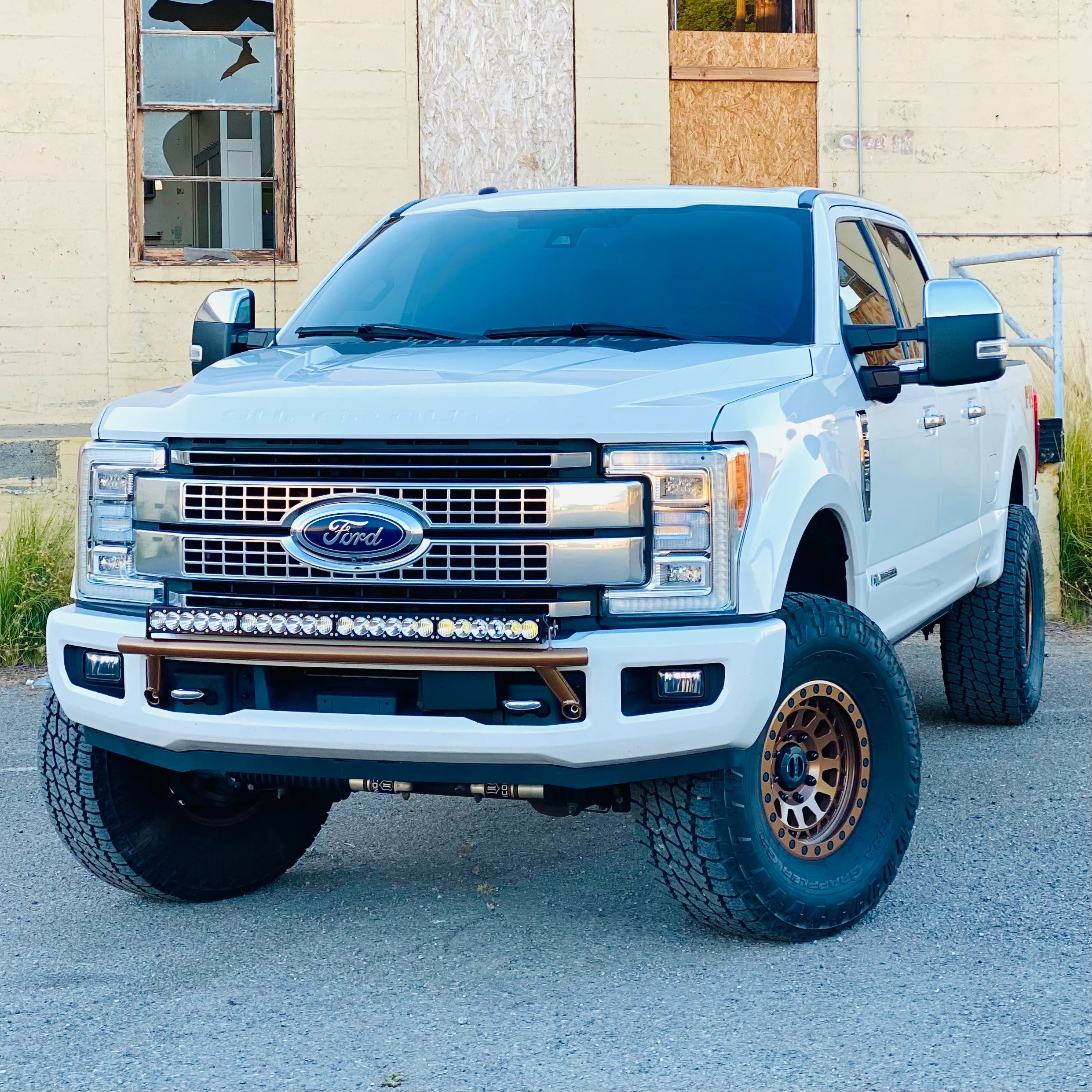 2017 - 2024 Ford Super Duty Light Mount - The "Low Pro" Series featuring a Baja Designs 40" Curved OnX6 Arc Mount Tabs - Apollo Off-Road