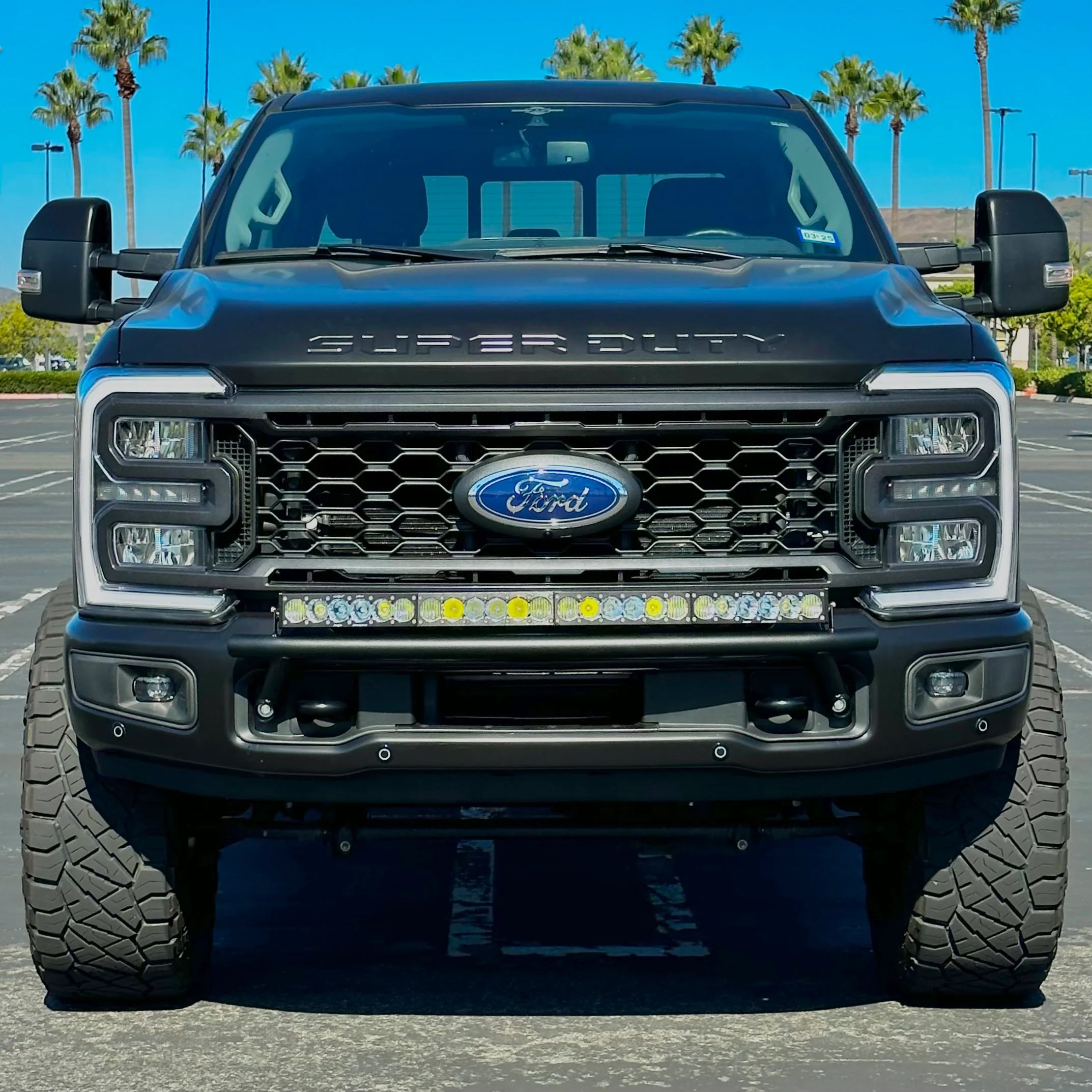 2017 - 2024 Ford Super Duty Light Mount - The "Low Pro" Series featuring a Baja Designs 40" Curved OnX6 Arc Mount Tabs - Apollo Off-Road