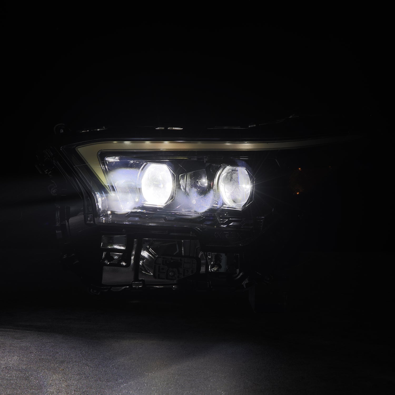 24-25 Toyota 4Runner/Tacoma LUXX-Series LED Projector Headlights Alpha-Black - Apollo Off-Road
