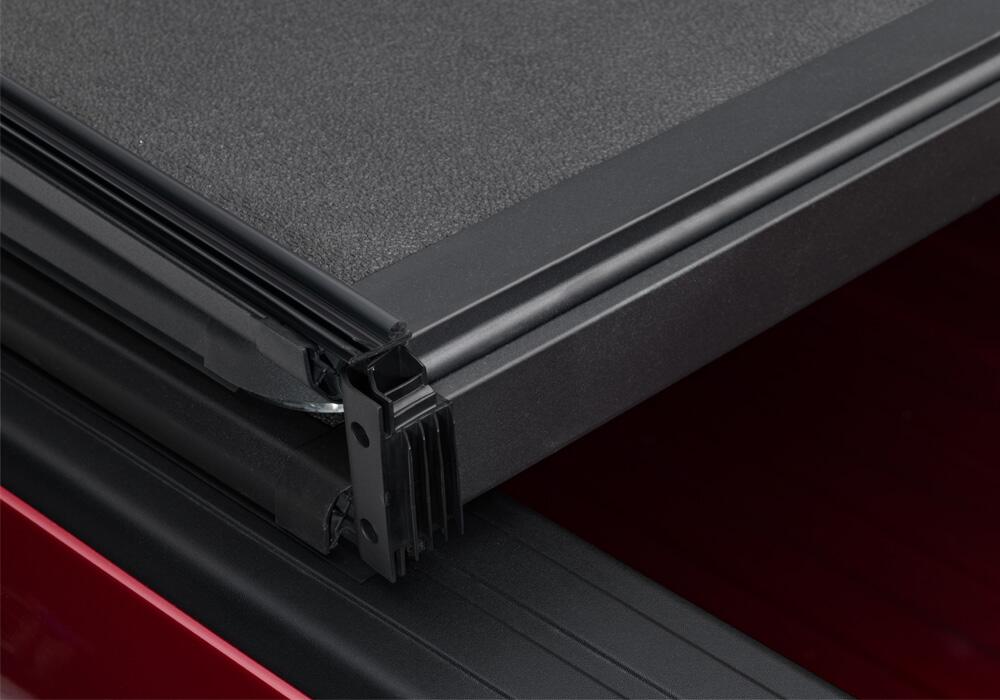 Solid Fold 2.0 Tonneau Cover Black Textured Paint 2019-2025 (New Body Style) Ram 5' 7 inch Bed with RamBox with or without Multifunction Tailgate Extang