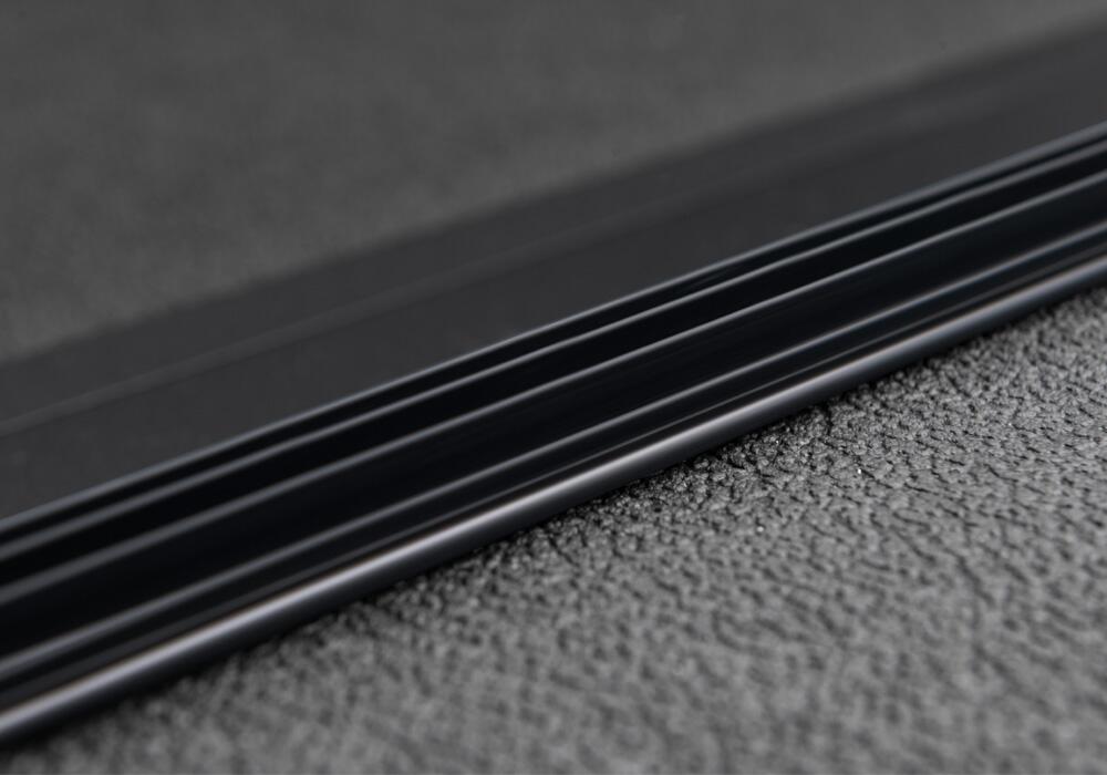 Solid Fold 2.0 Tonneau Cover Black Textured Paint 2019-2025 (New Body Style) Ram 5' 7 inch Bed with RamBox with or without Multifunction Tailgate Extang