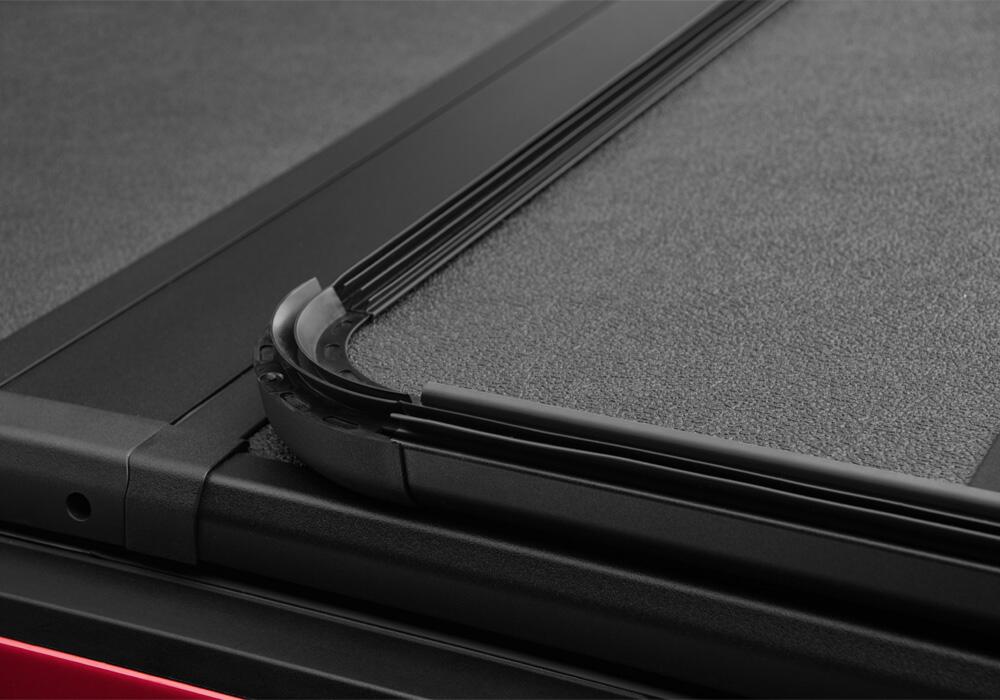 Solid Fold 2.0 Tonneau Cover Black Textured Paint 2019 (New Body Style)-2025 Silverado/Sierra (without CarbonPro Bed) 5' 9 inch Bed without Factory Side Storage Boxes with or without MultiPro/MultFlex Tailgate Extang