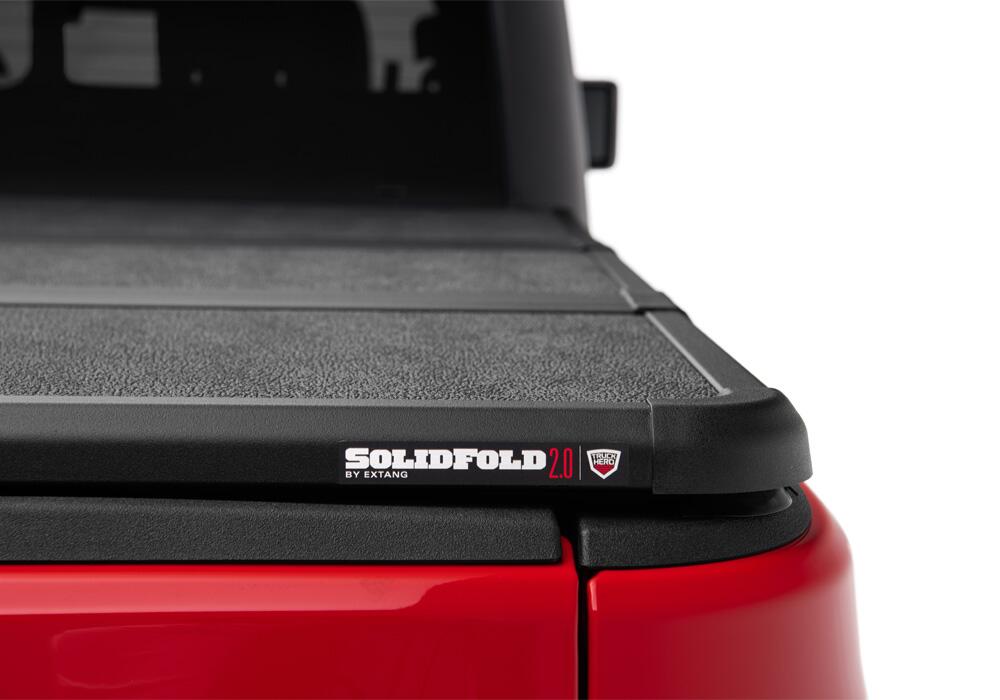 Solid Fold 2.0 Tonneau Cover Black Textured Paint 2020-2025 Jeep Gladiator (JT) with Trail Rail System Extang