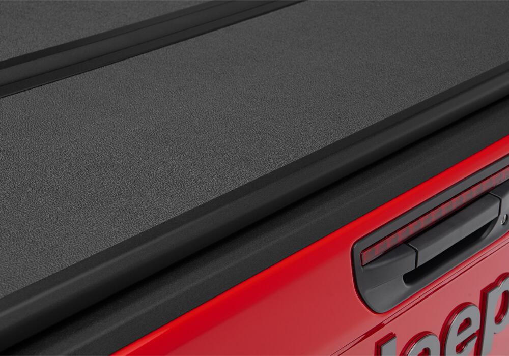 Solid Fold 2.0 Tonneau Cover Black Textured Paint 2020-2025 Jeep Gladiator (JT) with Trail Rail System Extang
