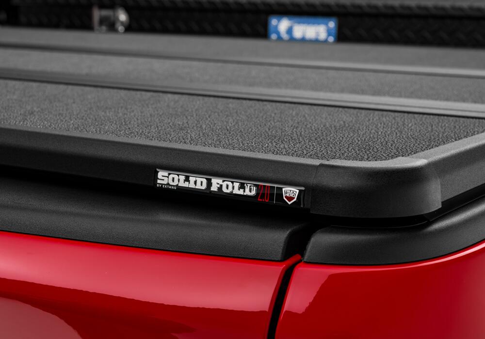 Solid Fold 2.0 Tool Box Tonneau Cover Black Textured Paint For Use w/Existing Tool Box Tool Box Not Included 2019-2026 (New Body Style) Ram 1500 6' 4 inch Bed without RamBox without Multifunction Tailgate Extang