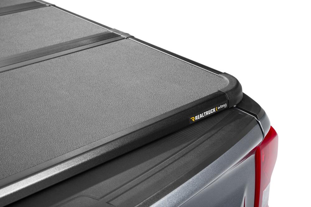 Solid Fold ALX Tonneau Cover Black Textured Paint 2020-2026 Silverado/Sierra 2500 HD/3500 HD 6' 9 inch Bed without Factory Side Storage Boxes Extang