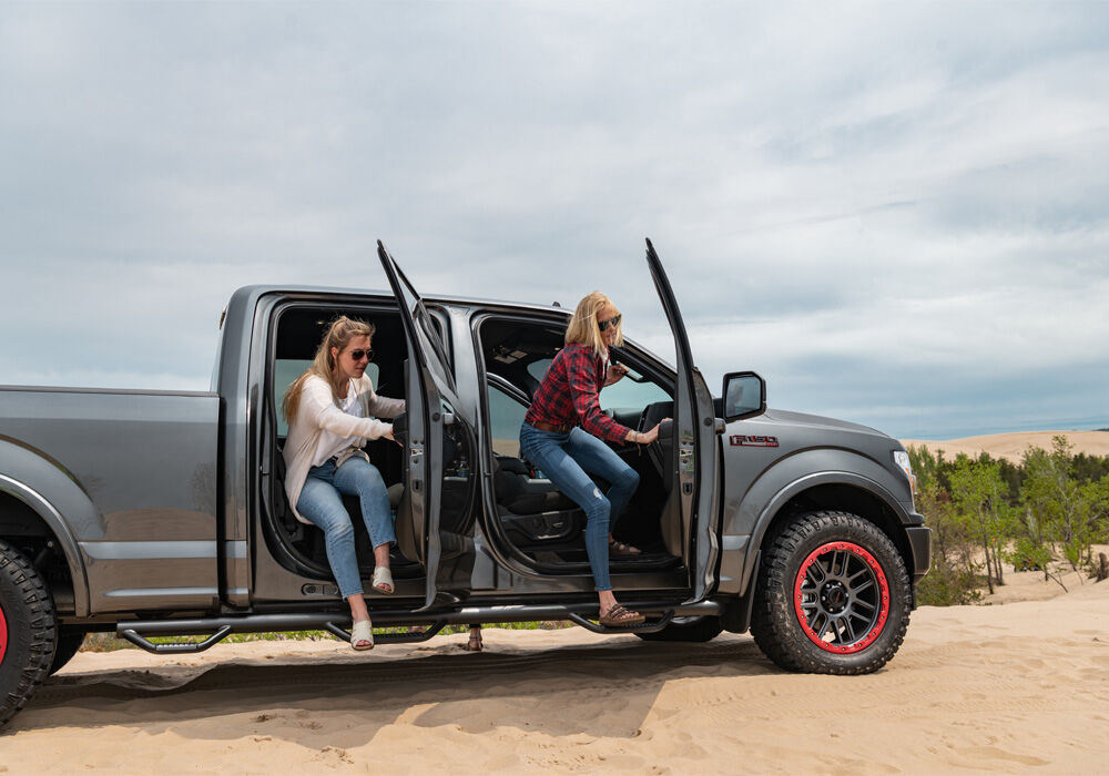 Nerf Step Bar Wheel-to-Wheel with Bed Access (3 Steps per Side) 3 Inch Main Tube Diameter 2017-2026 Ford F-350/F-450/F-550 8 Foot Bed Crew Cab with Dual Rear Wheels Textured Black NFab