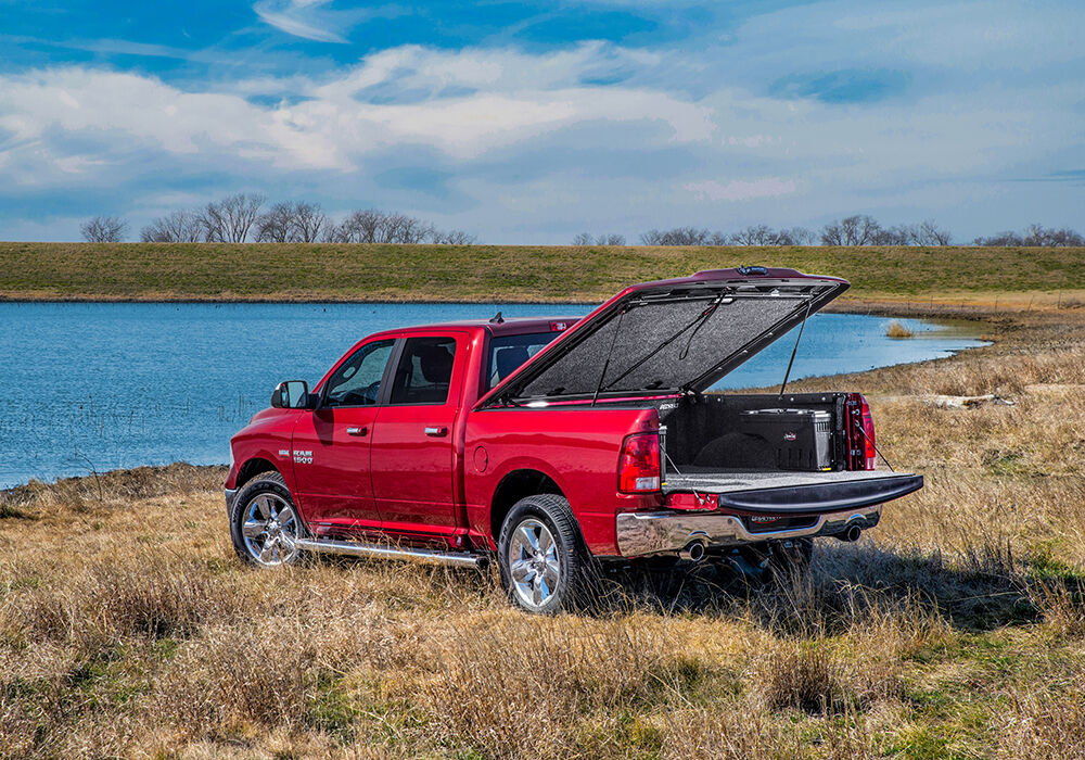Tonneau Cover Elite LX 2009-2018 (2019-2023 Classic) Ram 1500/2010-2023 2500/3500 6 Foot 4 Inch Bed Std/Quad/Mega With Single Rear Wheels Without RamBox Black UnderCover
