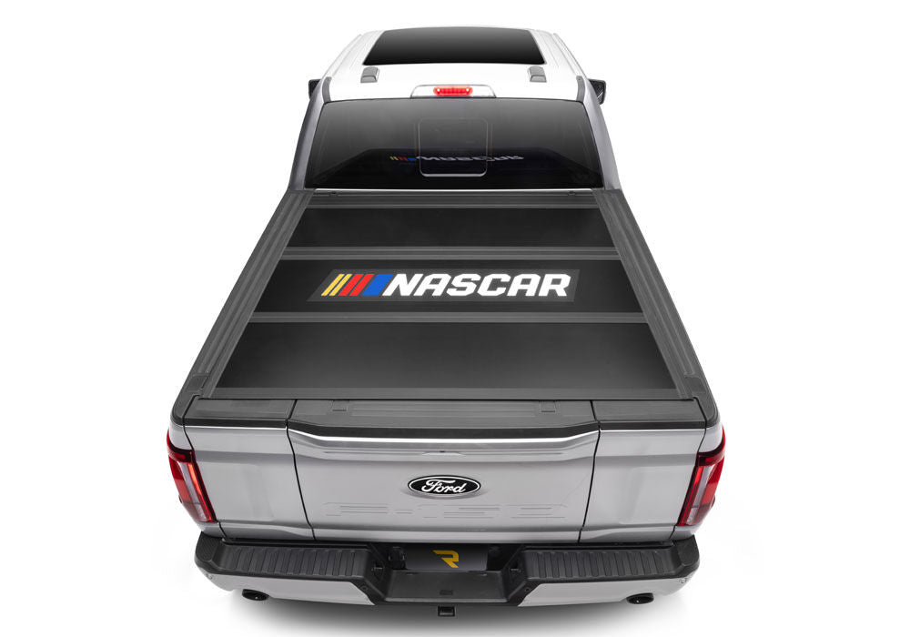 Tonneau Cover RealTruck NASCAR Edition 2019 (New Body Style) 2026 Chevrolet Silverado/GMC Sierra (Without CarbonPro Bed) 5 Foot 9 Inch Bed (New Body Style) Crew/Ext With Or Without MultiPro Tailgate Matte Black Finish
