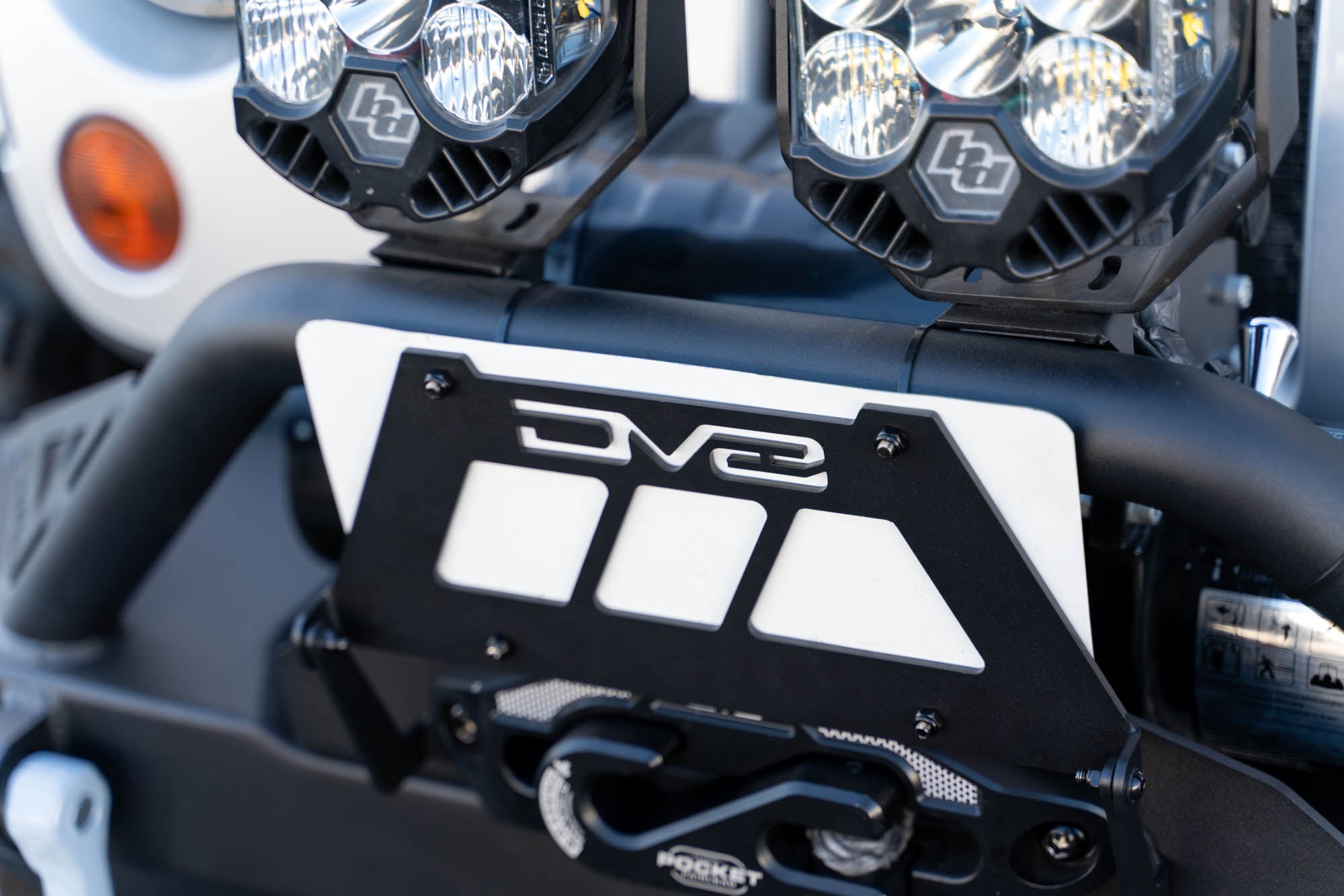 Fairlead Mounted Flip-Up License Plate Bracket - Apollo Off-Road