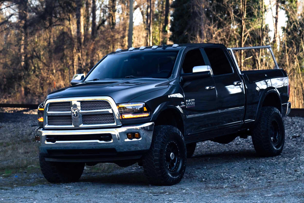 XB LED Headlights: Dodge Ram (09-18) (Pair / Amber DRL) - Apollo Off-Road