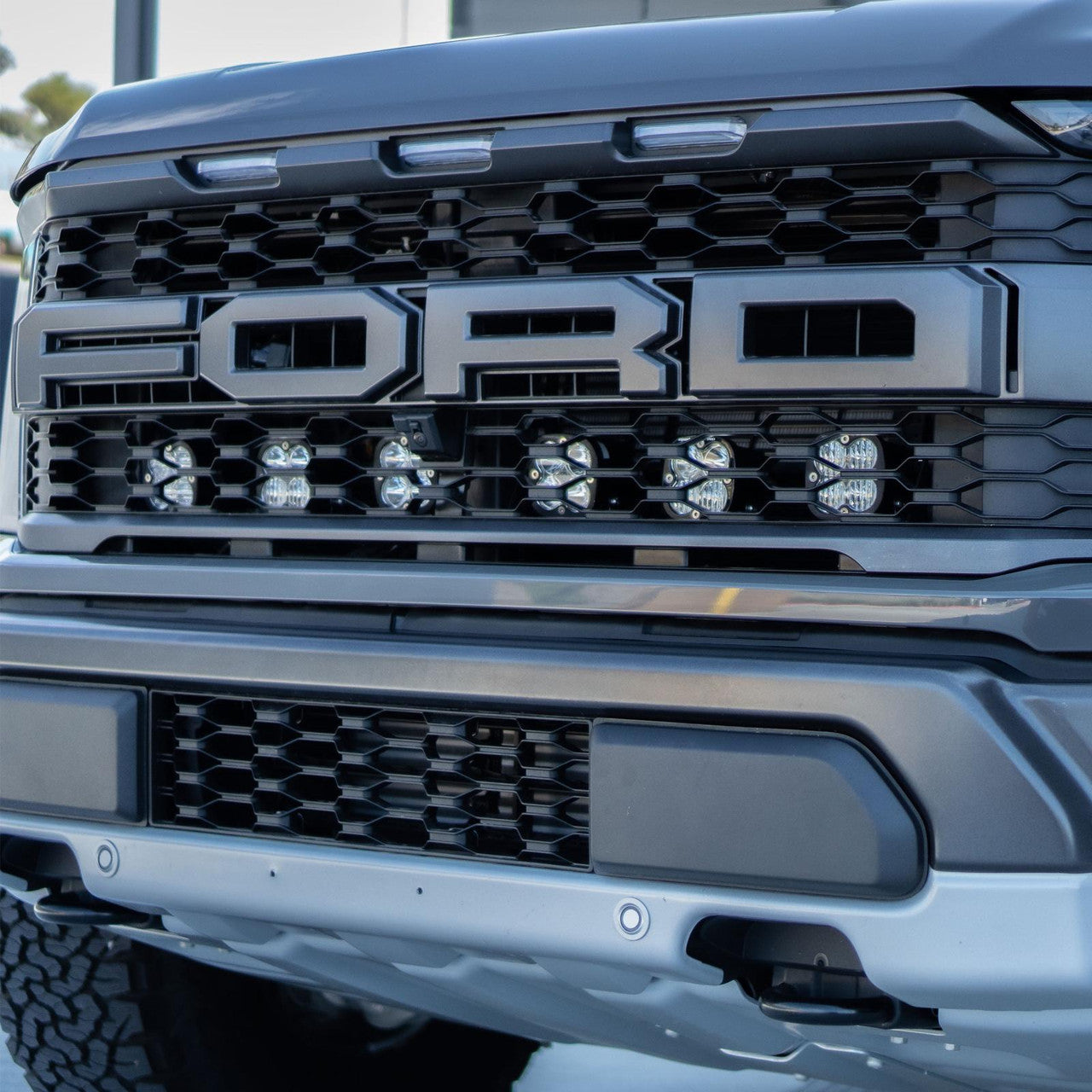 Baja Designs Ford Dual 10" OnX6+ Clear Behind Grille Light Bar Kit - Ford 2021+ F-150 Raptor