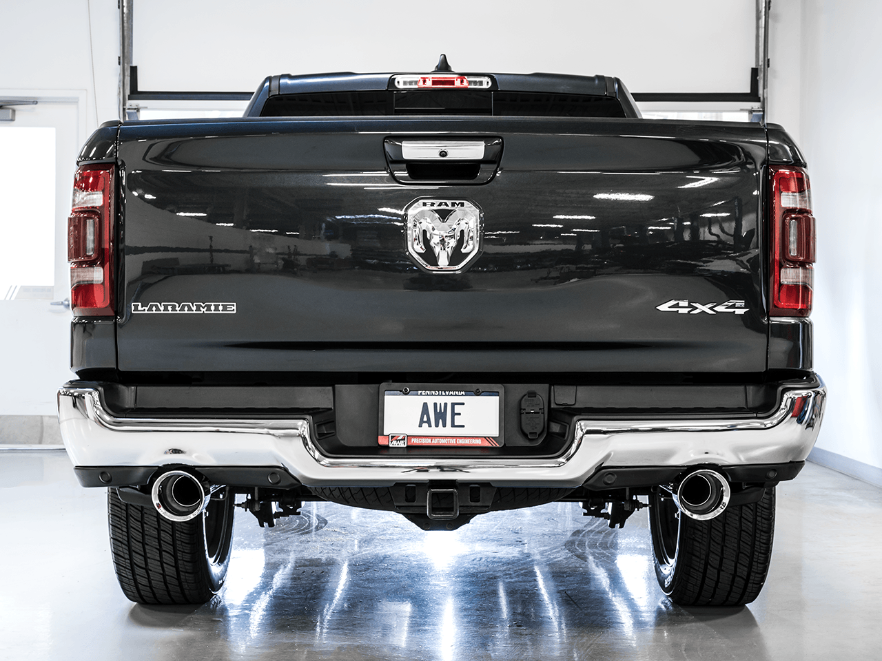 AWE 0FG Dual Rear Exit Catback Exhaust for 5th Gen RAM 1500 5.7L (With Bumper Cutouts) - Chrome Silver Tips - Apollo Off-Road