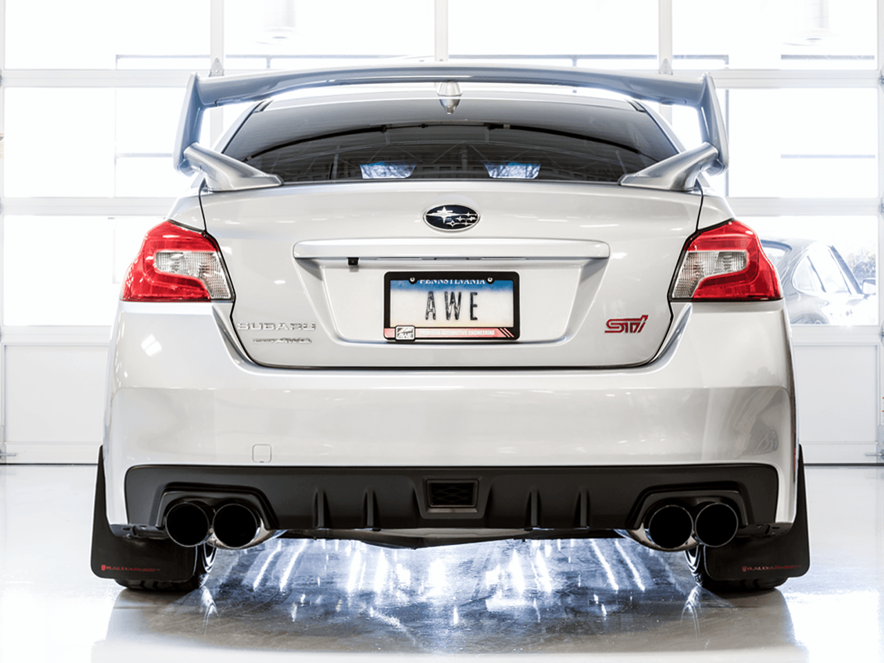AWE Touring Edition Exhaust for VA STI - GV WRX - GV STI Sedan - Diamond Black Quad Tips (102mm) - Apollo Off-Road