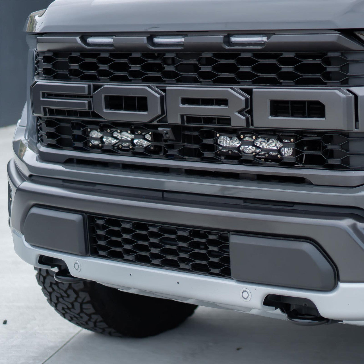 Baja Designs Ford Dual 10" OnX6+ Clear Behind Grille Light Bar Kit - Ford 2021+ F-150 Raptor - Apollo Off-Road
